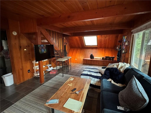 2548 Rim Of The World Dr, Running Springs, CA 92382 - tiled living area with wooden walls, a skylight, stairway, beam ceiling, and wood ceiling