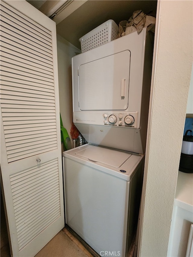 20334 Rue Crevier Unit 622, Canyon Country, CA 91351 - laundry area with stacked washer / dryer