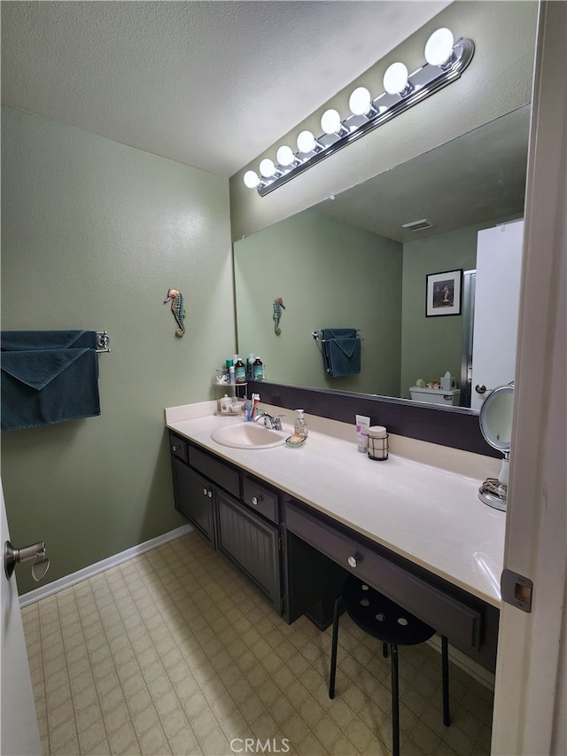 20334 Rue Crevier Unit 622, Canyon Country, CA 91351 - bathroom featuring vanity, tile patterned floors, and baseboards