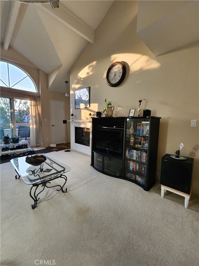 20334 Rue Crevier Unit 622, Canyon Country, CA 91351 - living area featuring carpet floors, beamed ceiling, high vaulted ceiling, and a glass covered fireplace
