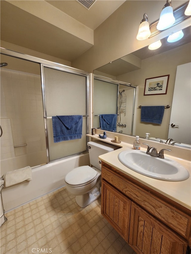 20334 Rue Crevier Unit 622, Canyon Country, CA 91351 - bathroom with toilet, vanity, enclosed tub / shower combo, and tile patterned floors