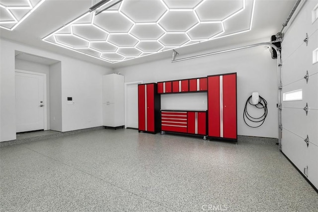 garage with baseboards