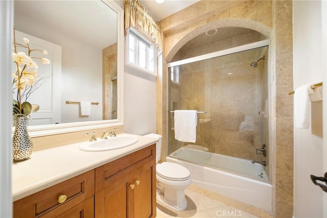 15850 Seville Ln, Encino, CA 91436 - bathroom featuring vanity, toilet, shower / tub combination, and tile patterned flooring