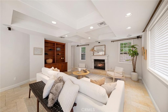 15850 Seville Ln, Encino, CA 91436 - living area with stone tile flooring, recessed lighting, coffered ceiling, a glass covered fireplace, and baseboards