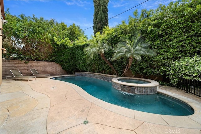 15850 Seville Ln, Encino, CA 91436 - view of pool with fence, a patio area, and a pool with connected hot tub