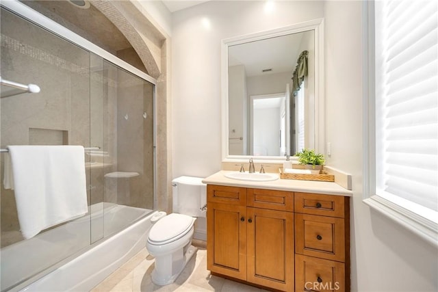 15850 Seville Ln, Encino, CA 91436 - bathroom with toilet, vanity, and enclosed tub / shower combo