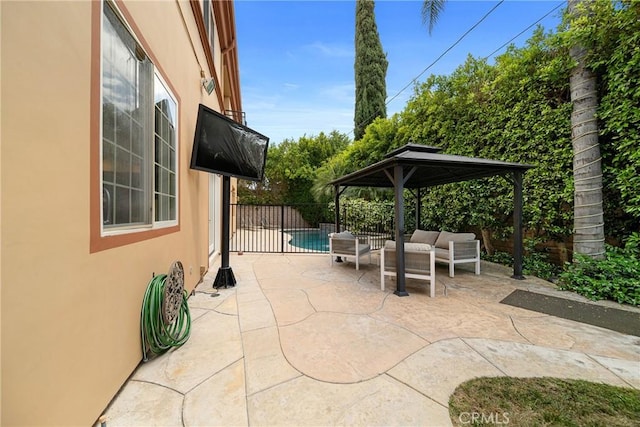 15850 Seville Ln, Encino, CA 91436 - view of patio with an outdoor hangout area, a fenced backyard, and a gazebo