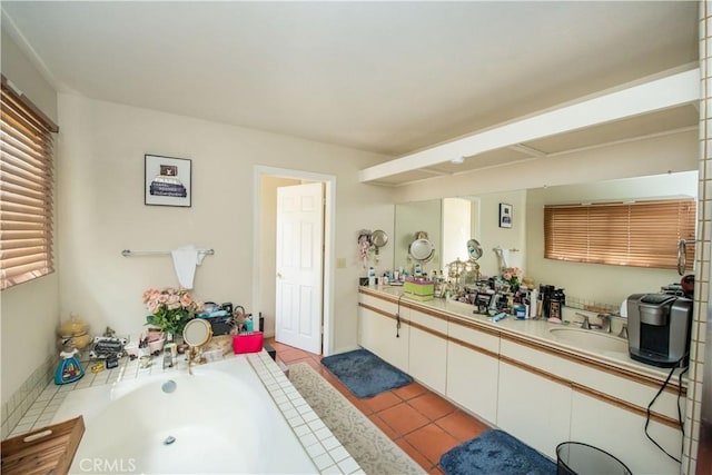 9092 S Rama St, Villa Park, CA 92861 - full bathroom with double vanity, a garden tub, and tile patterned flooring
