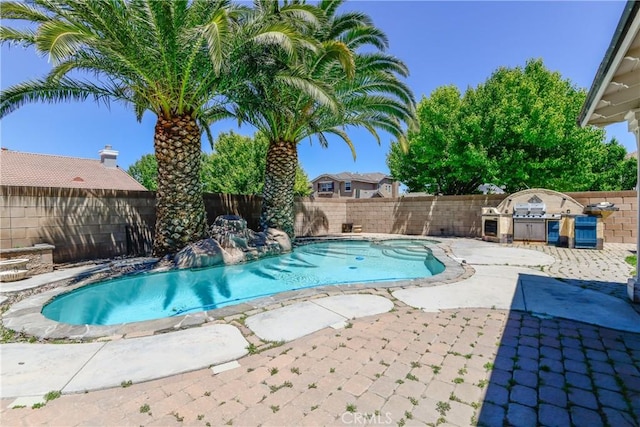 view of pool featuring a fenced backyard and a patio area