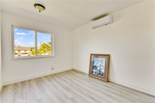 212 Macalester Dr, Walnut, CA 91789 - spare room with a wall unit AC, wood finished floors, and baseboards