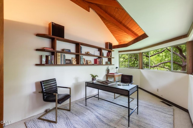 carpeted office with wood ceiling and baseboards
