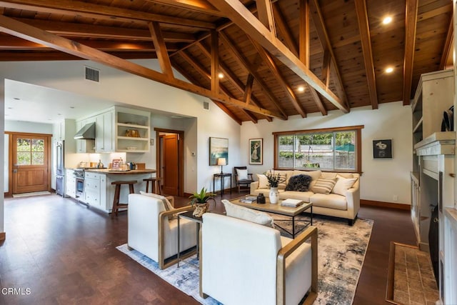 living area with a fireplace with flush hearth, wood ceiling, dark wood finished floors, beam ceiling, and high vaulted ceiling