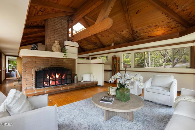 living room with wooden ceiling, hardwood / wood-style floors, beamed ceiling, a fireplace, and high vaulted ceiling
