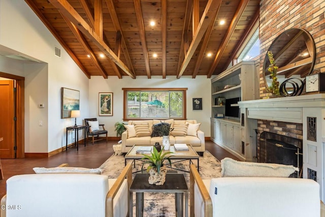 living area featuring wood ceiling, wood finished floors, baseboards, and a fireplace