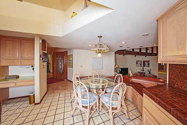 dining room featuring recessed lighting and a chandelier