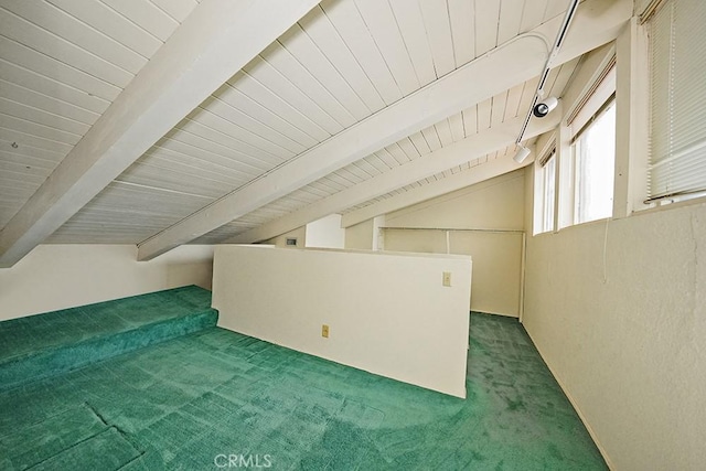 bonus room with carpet floors, beam ceiling, and wood ceiling