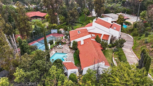 view from above of property with a pool area