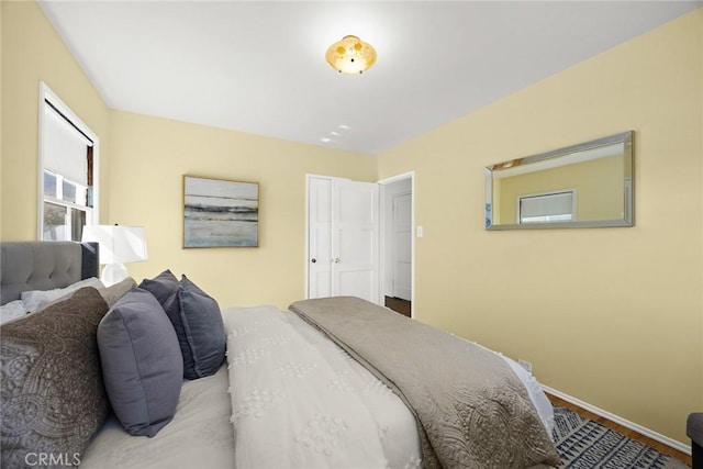 333 W Andrix St, Monterey Park, CA 91754 - bedroom featuring baseboards and wood finished floors