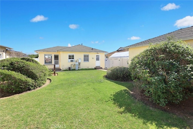 333 W Andrix St, Monterey Park, CA 91754 - rear view of house featuring stucco siding and entry steps