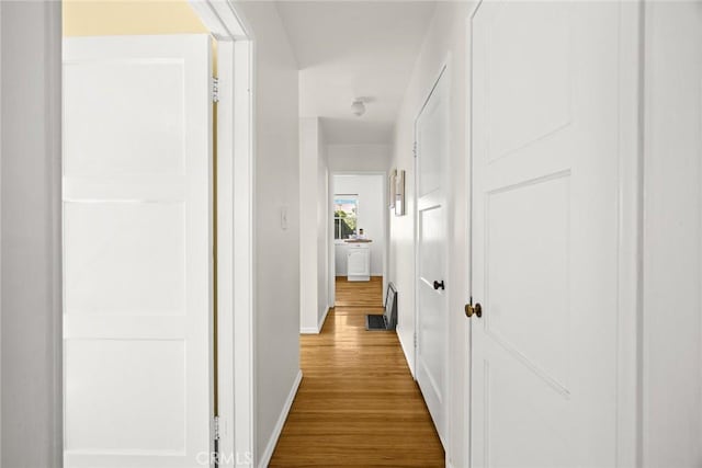 333 W Andrix St, Monterey Park, CA 91754 - hallway featuring wood finished floors and baseboards