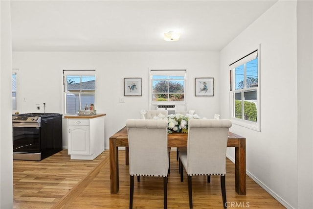 333 W Andrix St, Monterey Park, CA 91754 - dining area featuring light wood-style flooring and baseboards