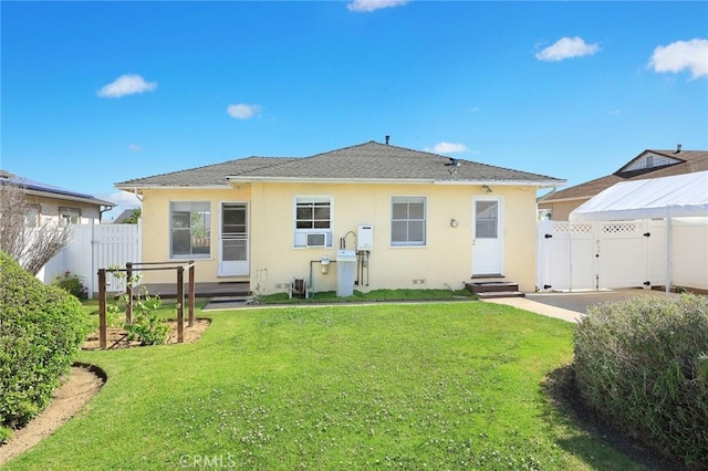 333 W Andrix St, Monterey Park, CA 91754 - back of property with entry steps, stucco siding, a gate, and a shingled roof