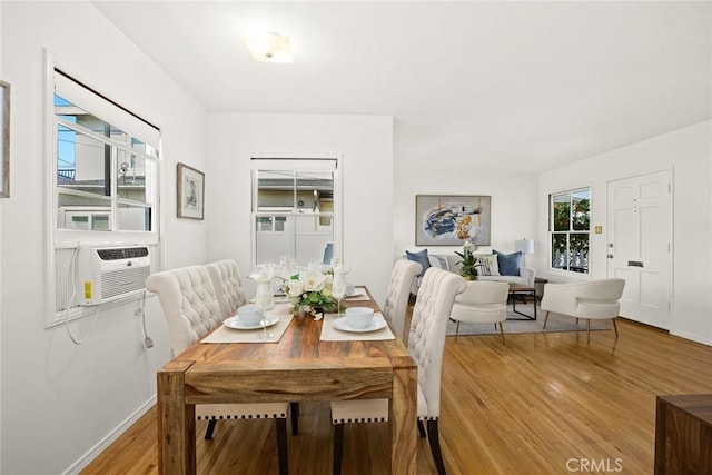 333 W Andrix St, Monterey Park, CA 91754 - dining room featuring light wood-style floors, baseboards, and cooling unit