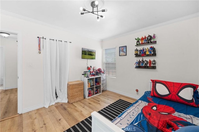 5927 Mckinley Ave, South Gate, CA 90280 - bedroom featuring ornamental molding, wood finished floors, a chandelier, and baseboards
