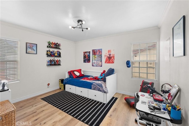5927 Mckinley Ave, South Gate, CA 90280 - bedroom with ornamental molding, wood finished floors, multiple windows, baseboards, and a chandelier