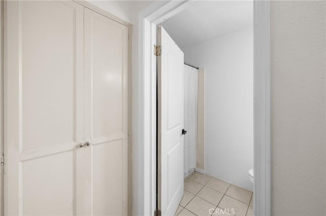 5927 Mckinley Ave, South Gate, CA 90280 - bathroom with toilet and tile patterned flooring