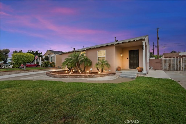 5927 Mckinley Ave, South Gate, CA 90280 - view of front of home featuring stucco siding