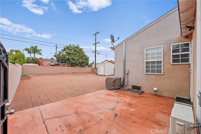 5927 Mckinley Ave, South Gate, CA 90280 - fenced backyard with a patio area