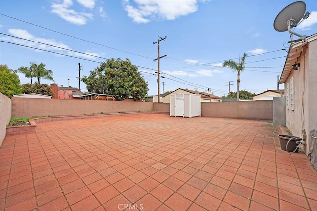 5927 Mckinley Ave, South Gate, CA 90280 - fenced backyard featuring a patio area