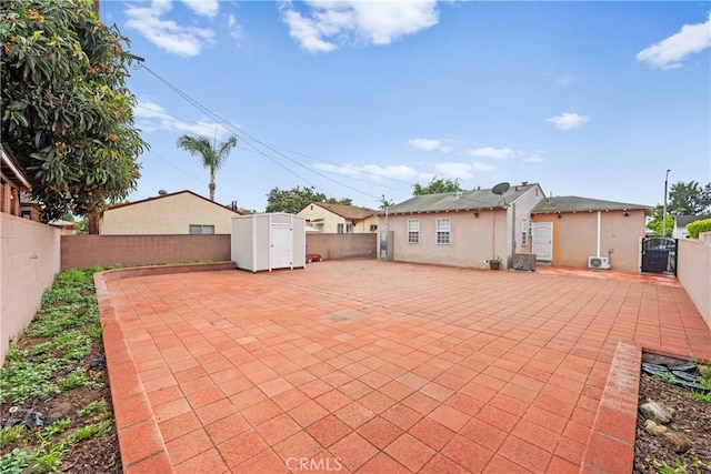 5927 Mckinley Ave, South Gate, CA 90280 - fenced backyard featuring a patio and a gate