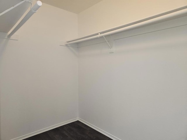 600 N The Strand Unit 12, Oceanside, CA 92054 - spacious closet with dark wood finished floors