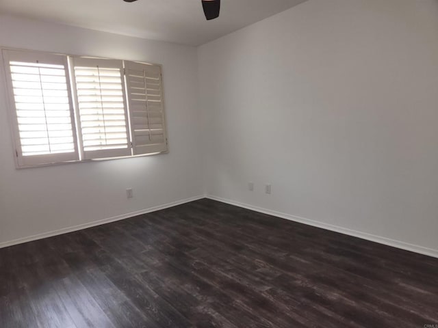 600 N The Strand Unit 12, Oceanside, CA 92054 - unfurnished room featuring a ceiling fan, dark wood-type flooring, and baseboards
