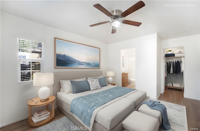 25892 Iris Ave Unit A, Moreno Valley, CA 92551 - bedroom with wood finished floors, a spacious closet, a closet, and ensuite bath