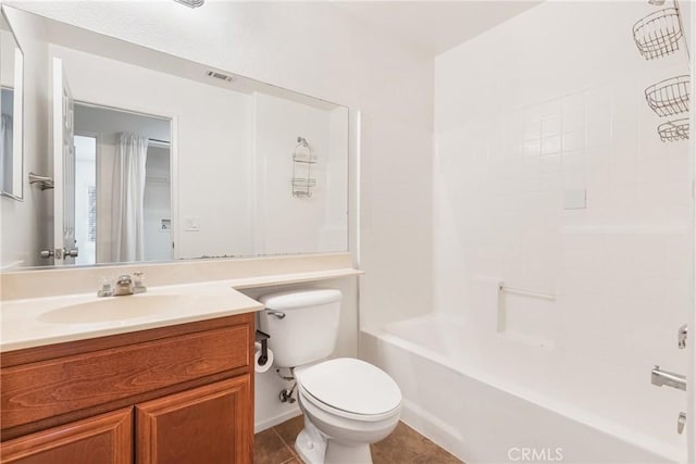 25892 Iris Ave Unit A, Moreno Valley, CA 92551 - full bathroom featuring vanity, toilet, tile patterned floors, and bathtub / shower combination