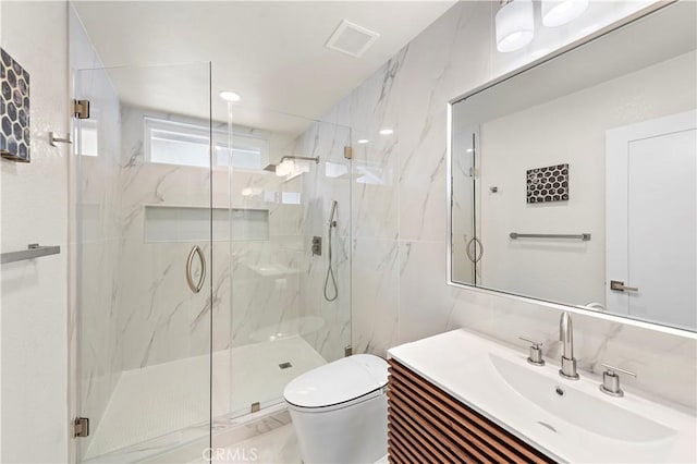 27751 Via Lorca, Mission Viejo, CA 92692 - full bath with toilet, a marble finish shower, tile walls, and vanity