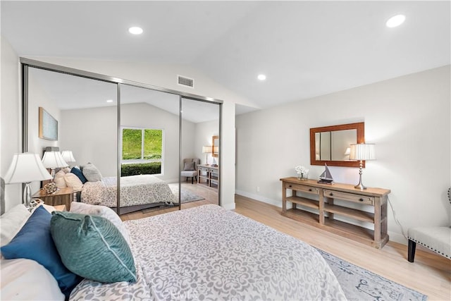 27751 Via Lorca, Mission Viejo, CA 92692 - bedroom with lofted ceiling, light wood-type flooring, a closet, recessed lighting, and baseboards