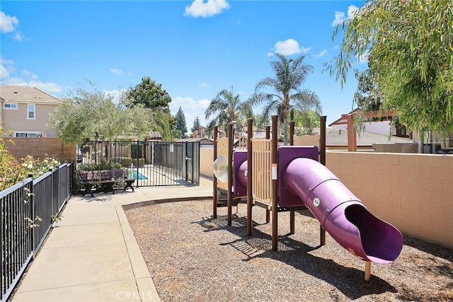 community play area featuring fence