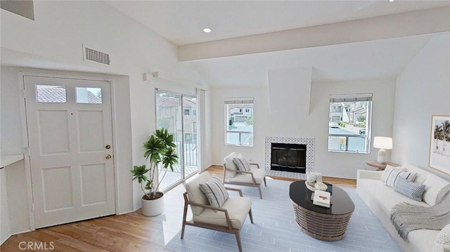 137 Corsica Dr, Newport Beach, CA 92660 - living area with wood finished floors, a fireplace, and recessed lighting