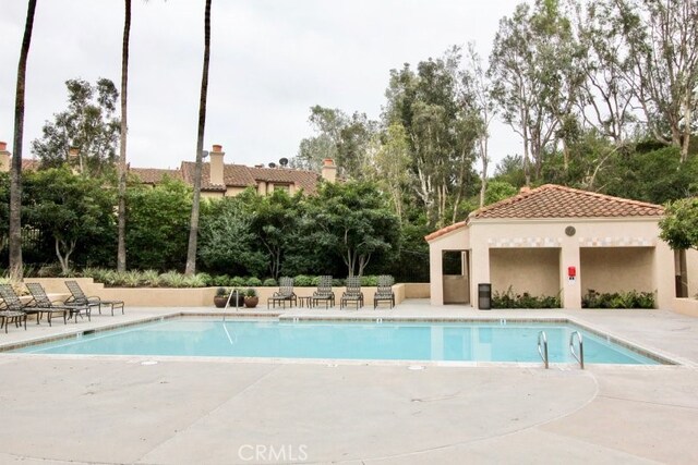 137 Corsica Dr, Newport Beach, CA 92660 - community pool featuring a patio area