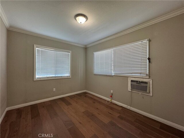 1828A New Ave, San Gabriel, CA 91776 - spare room with wood finished floors, crown molding, baseboards, and a wall unit AC