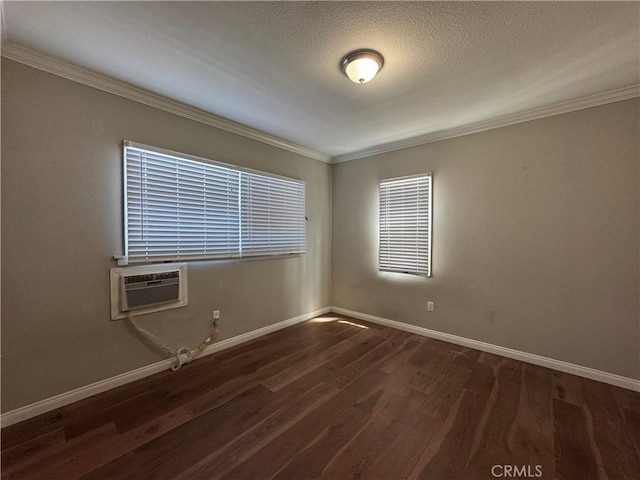 1828A New Ave, San Gabriel, CA 91776 - unfurnished room featuring dark wood-style floors, crown molding, baseboards, a textured ceiling, and an AC wall unit