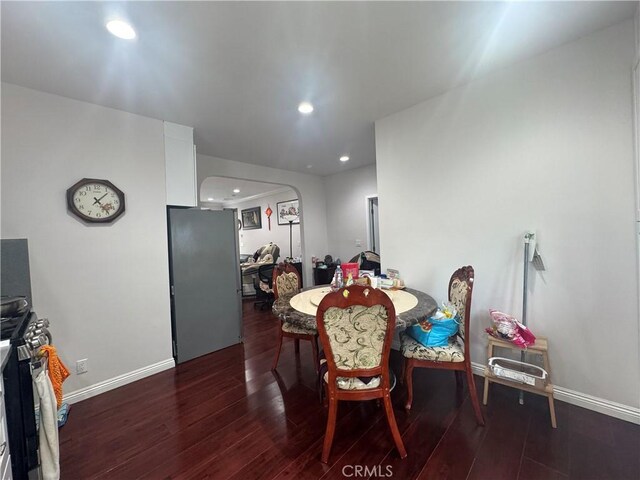 1828A New Ave, San Gabriel, CA 91776 - dining room with arched walkways, recessed lighting, wood finished floors, and baseboards