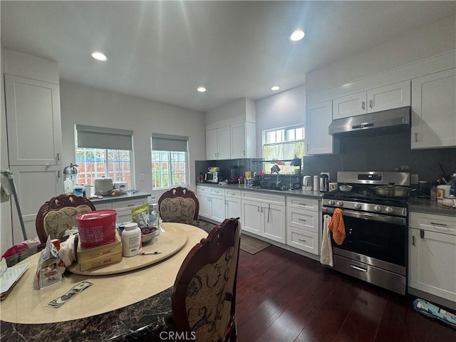 1828A New Ave, San Gabriel, CA 91776 - kitchen with stainless steel gas range, under cabinet range hood, plenty of natural light, tasteful backsplash, and recessed lighting