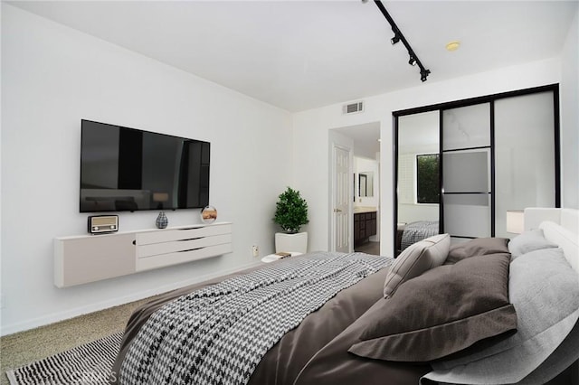 18600 Clark St Unit 102, Tarzana, CA 91356 - bedroom with carpet and track lighting