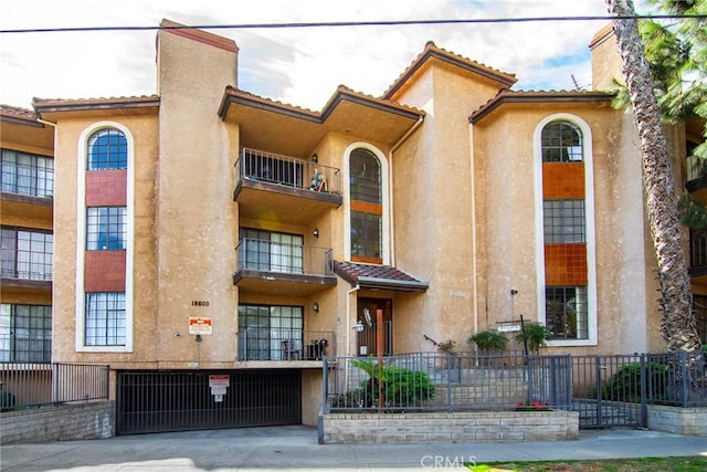18600 Clark St Unit 102, Tarzana, CA 91356 - view of building exterior with fence