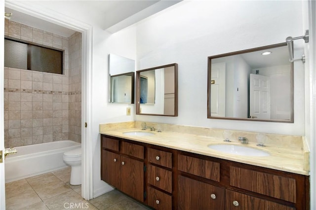 18600 Clark St Unit 102, Tarzana, CA 91356 - full bath featuring toilet, double vanity, and tile patterned floors